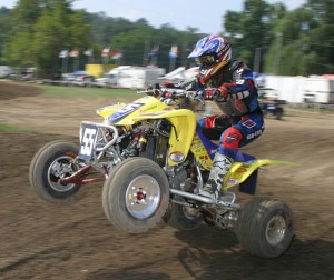 "Digger" Doug Gust charges through the whoops after the finish line.