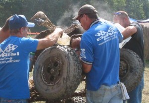 The DeRisi Racing crew cools off the hot running 250R of Santo DeRisi.