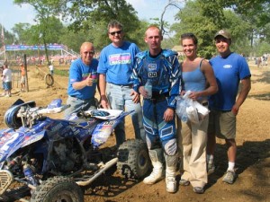 photo by Jorge Cuartas No yellow here - just Yamaha blue. Left to right is some of the MVPs behind Jeremiah Jones; Jim Jones, Curtis Sparks, Jeremiah, Jamie Rentz and James Perry (JPMX).