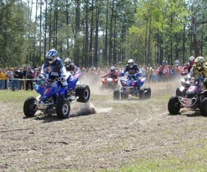 Bill Ballance took the holeshot with brother Brandon and Chris Borich eager to get a good start as well. Check out Bill's nose wheelie as he approaches the first turn!