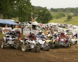 Spader leads the field through moto one's first turn. He did the same in moto two. 