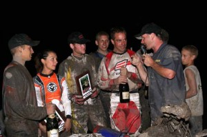 John "Ironman" Natalie (the winning est single year rider in ATV racing history) explains it all with John Pellan. Natalie and Borich later demonstrated proper Champaign opening celebration to second and third place teams.