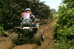 IronWOMAN, Kim Muzzarelli brings it on home in the final hour. Check out the pile of rail road ties. There's literally thousands on the Wildcat Creek property. These babies will make for interesting obstacles for the QuadTerrain riders at the WPSA ATV Tour July 22-23. 