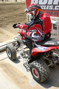 Here Doug Eichner pulls into his new starting spot with his new 2008 well-prepped Polaris Outlaw.