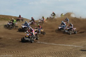 The AMA Pro ATV field races out of the gate at Sunset Ridge MX.